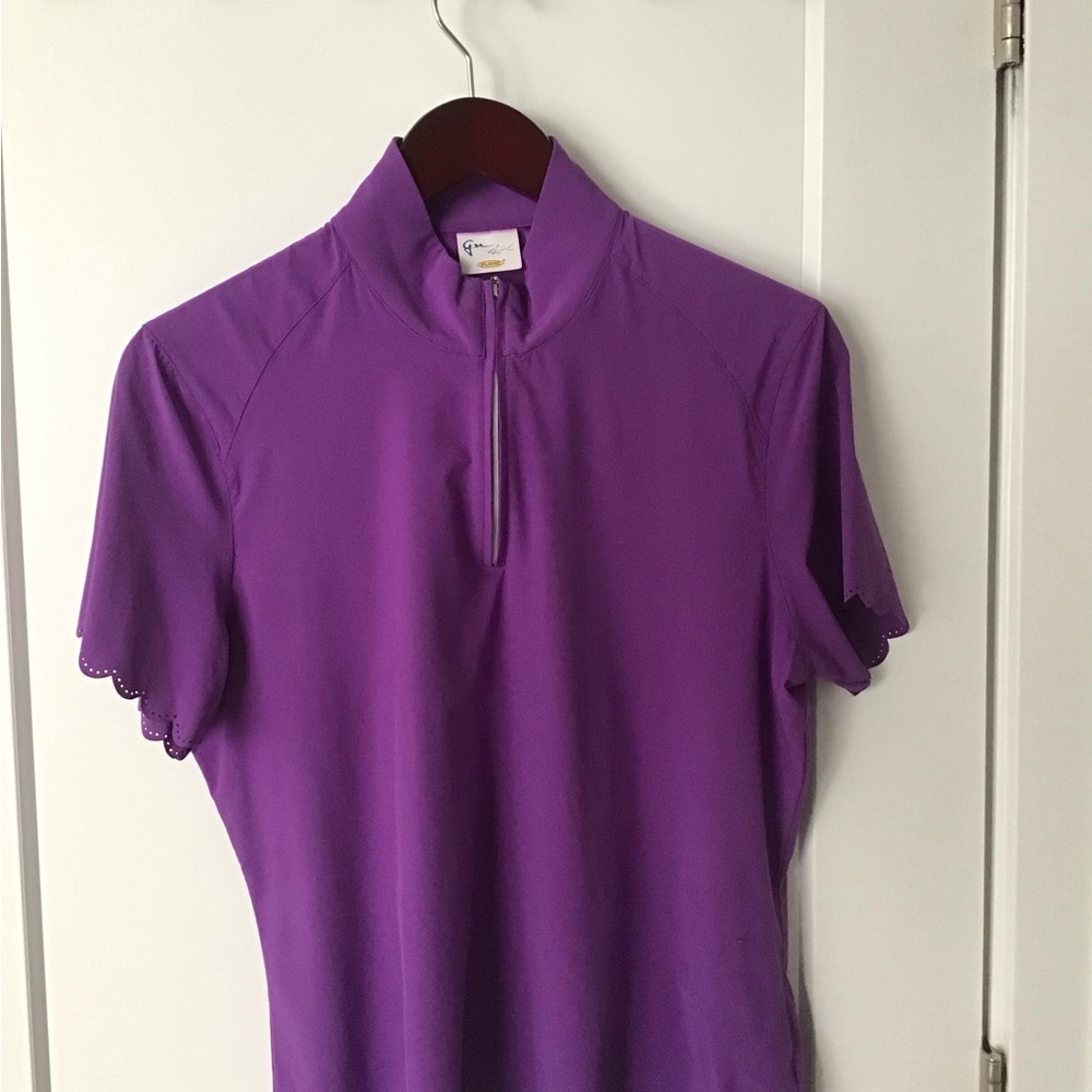 Women’s size large, Greg Norman play dry, purple, scalloped golf polo